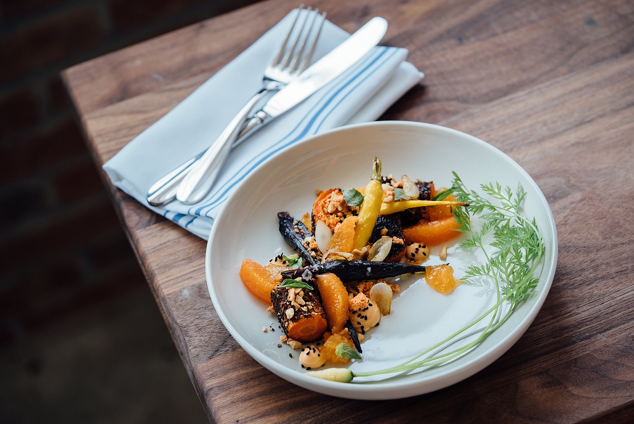 Plated fine-dining bowl on a dark table